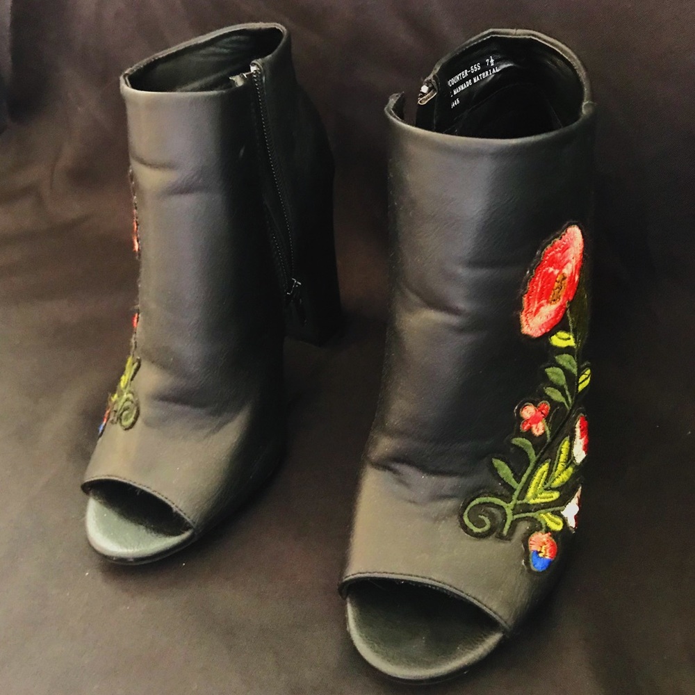 Black embroidered boot heels